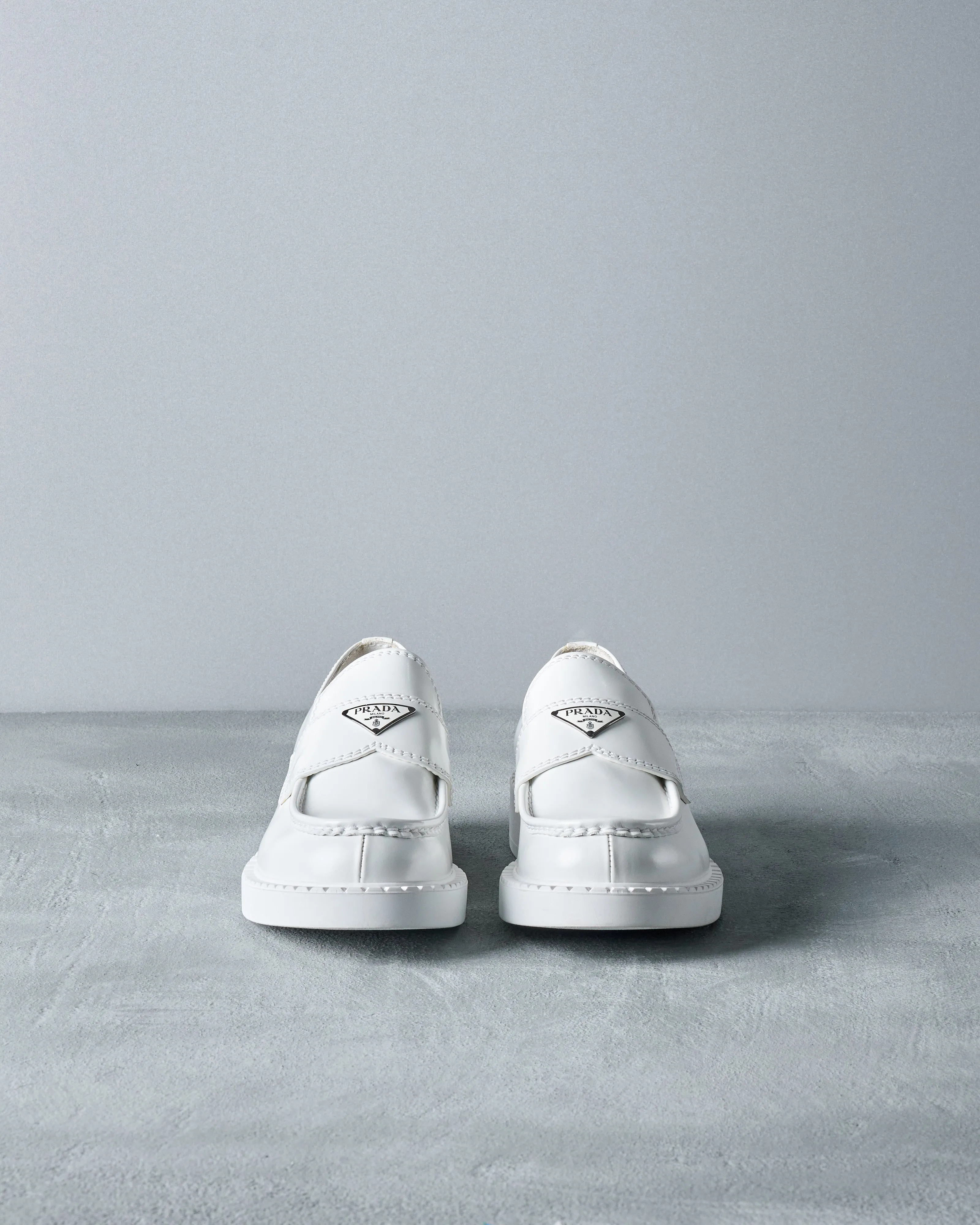 Prada White Chocolate patent leather loafers