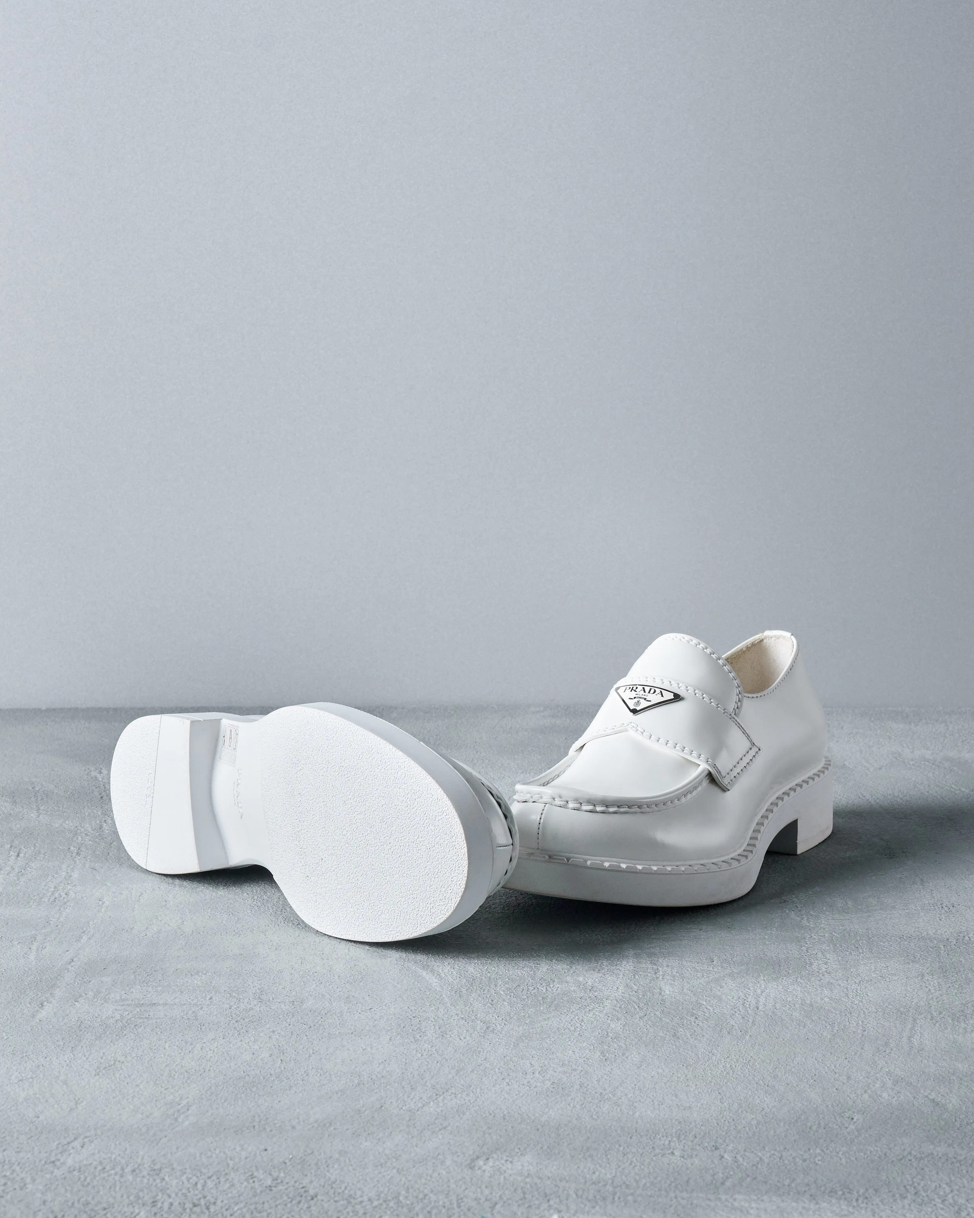 Prada White Chocolate patent leather loafers